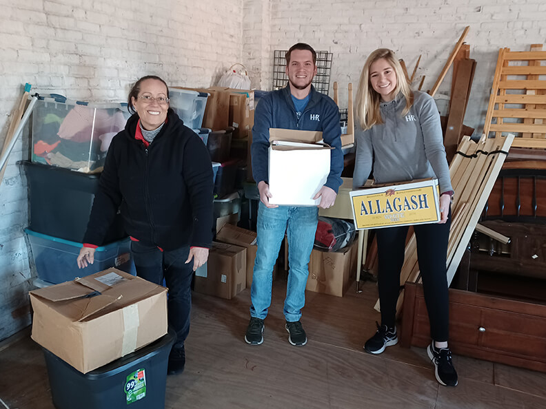 Chris S., Ginger, Andrew, Lisa, Laken, Brooke, Corey, and Minerva helped move boxes from Bell Socialization's warehouse to the Salvation Army thrift store.
